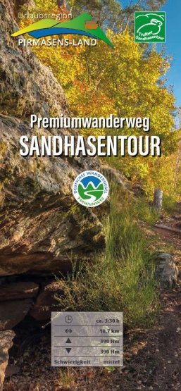 Flyer Sandhasentour Vorderseite Flyer Sandhasentour grüner Waldboden mit bunten Blättern